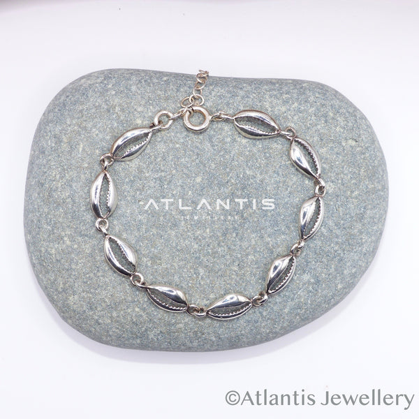 Cowrie Shell Multi Bracelet with Oxidized Detailing